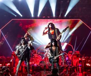 Photo of KISS performing live in an arena