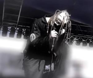 A screenshot of Corey Taylor singing 'Wait and Bleed' from the official video