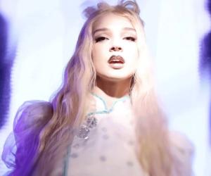 A screenshot of Poppy taken from the 'Spit' video clip. 