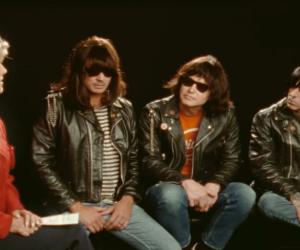 a screenshot of blink-182 in the 'Dance With Me' video clip. 