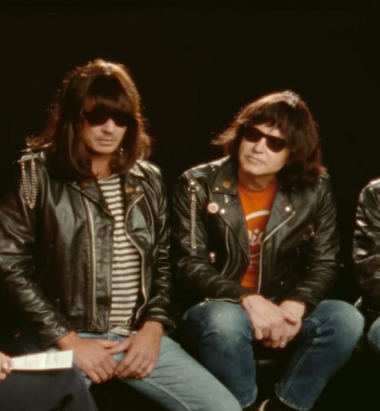 a screenshot of blink-182 in the 'Dance With Me' video clip. 